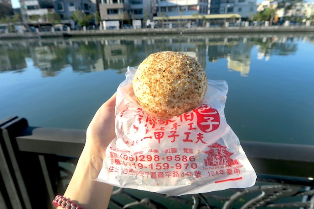 Eating Steamed Cheese Bun by Uncle A-Shui's Traditional Bun store by a river in Tainan